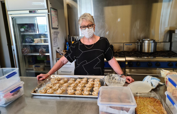 Happy home baker at home in Lodge kitchen